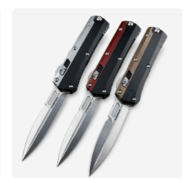 Three original Switchblade Flick knives on a white background